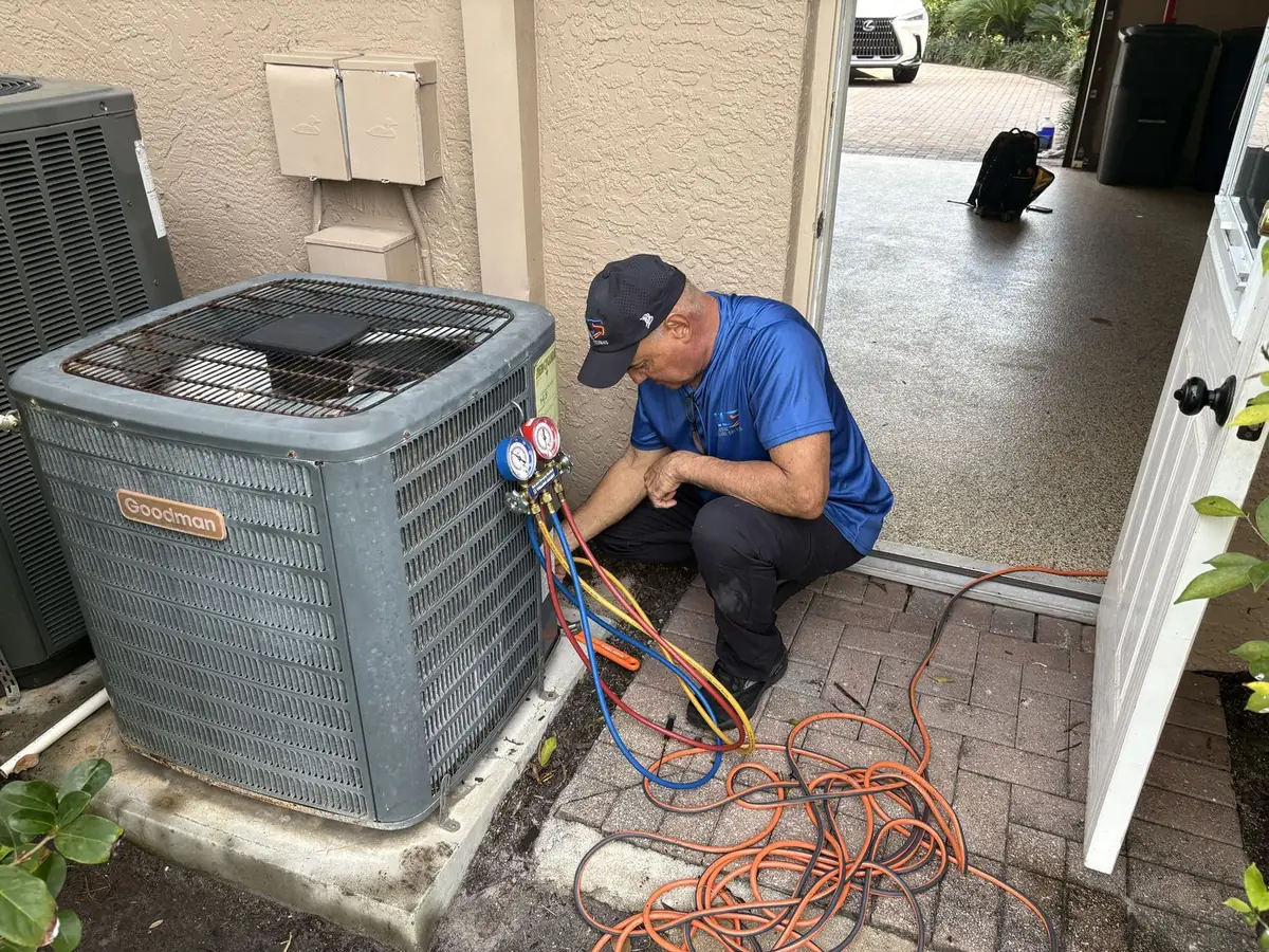 Exclusive Cooling Solutions owner checking refrigerant charge on a job in Cape Coral