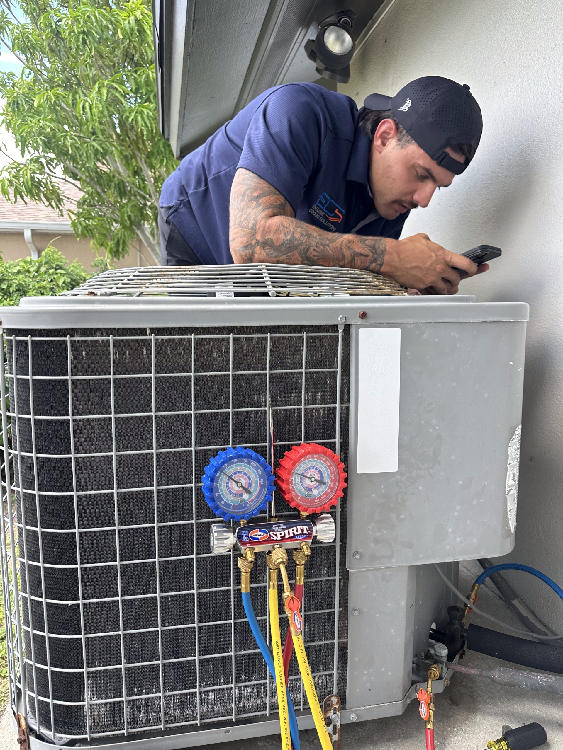 ECS HVAC technician diagnosing AC unit Cape Coral FL — same day emergency AC repair